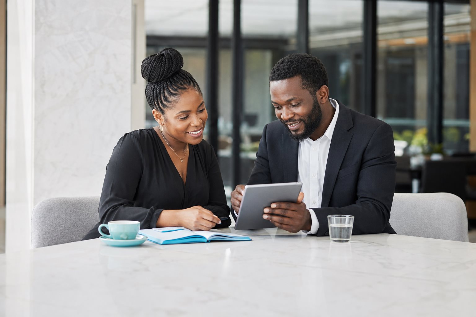 A business owner and consultant having a positive professional conversation